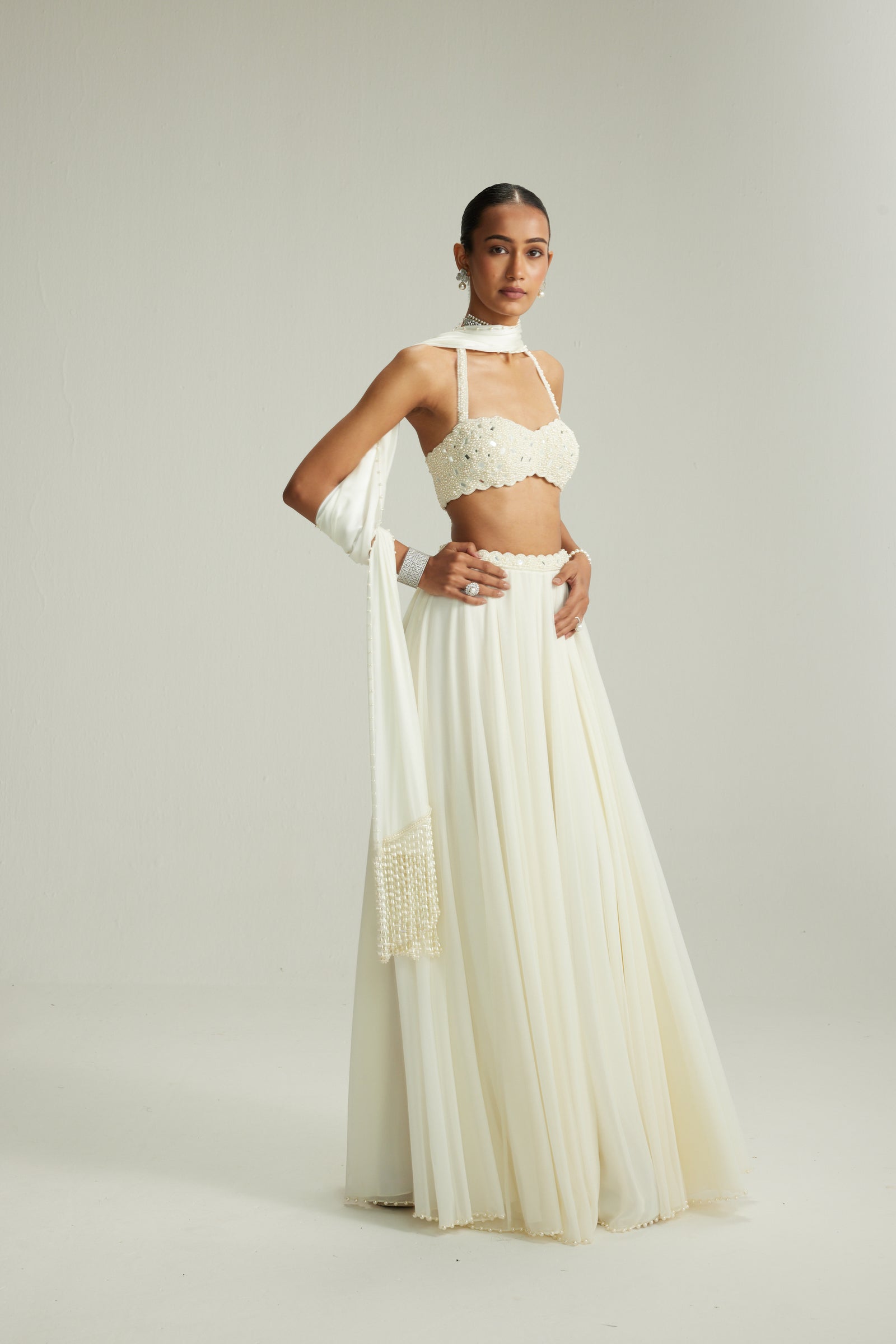 Off White Skirt Set With Halter Neck Blouse