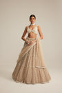Light Beige Pearl Drop Multi Tier Lehenga Set.