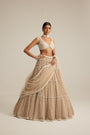 Light Beige Pearl Drop Multi Tier Lehenga Set.