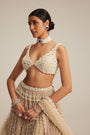Light Beige Pearl Drop Multi Tier Lehenga Set.