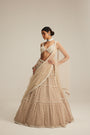 Light Beige Pearl Drop Multi Tier Lehenga Set.