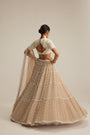 Light Beige Pearl Drop Multi Tier Lehenga With High Neck Blouse Set.