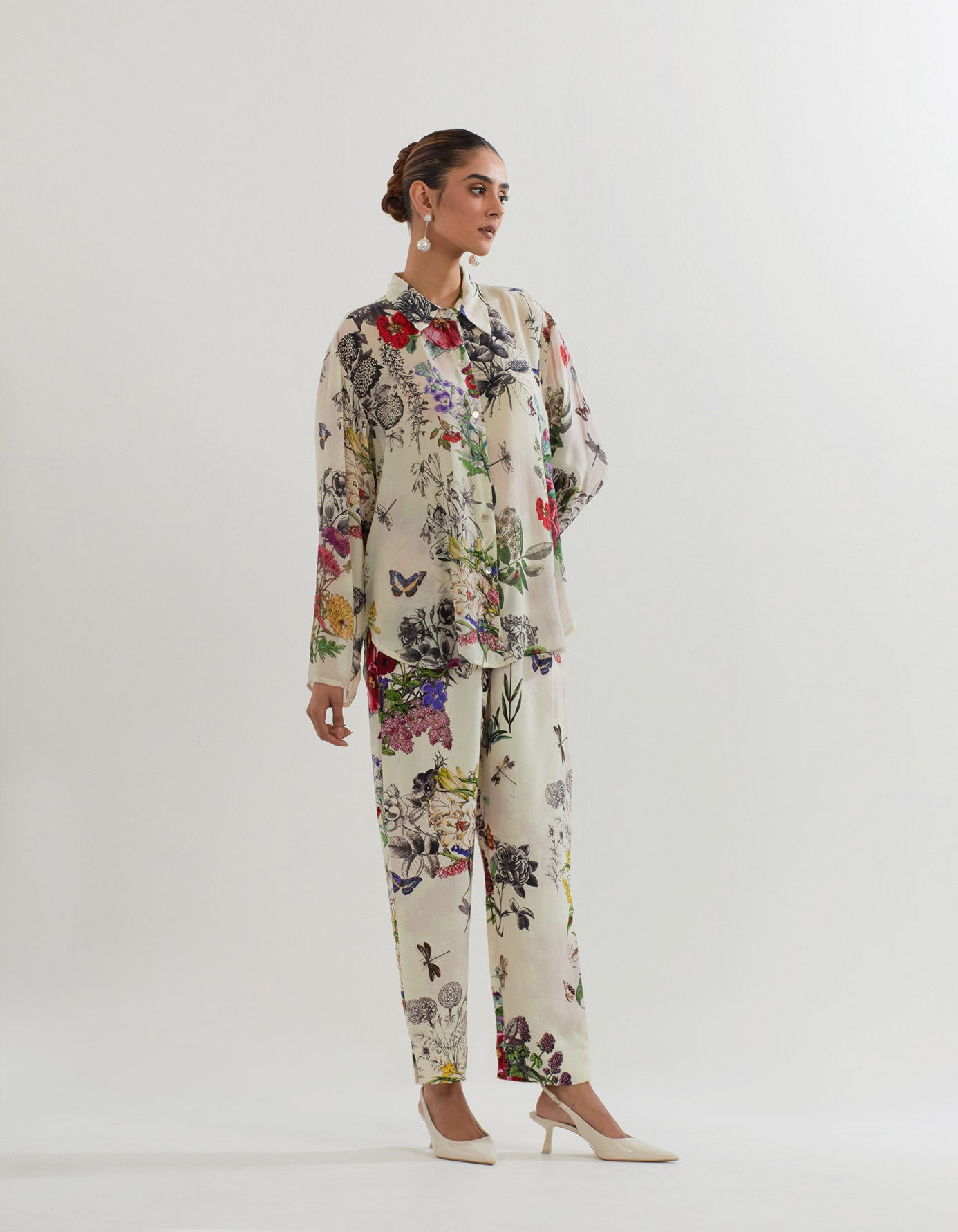 Crepe shirt in botanical print paired with  heavy georgette pants