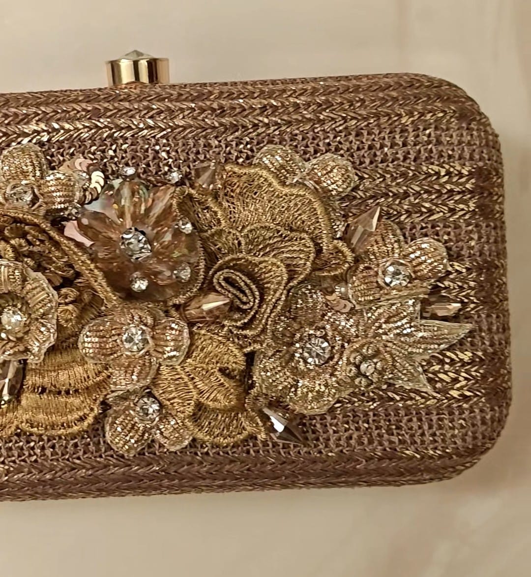 Bronze clutch/sling with a gold frame and a diamond clasp