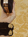 Luxurious Black velvet yarn entwined together with a french weave