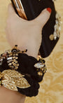 Luxurious Black velvet yarn entwined together with a french weave
