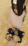 Luxurious Black velvet yarn entwined together with a french weave
