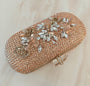 Floral diamond hand embroidered and set in a gold frame with a translucent clasp