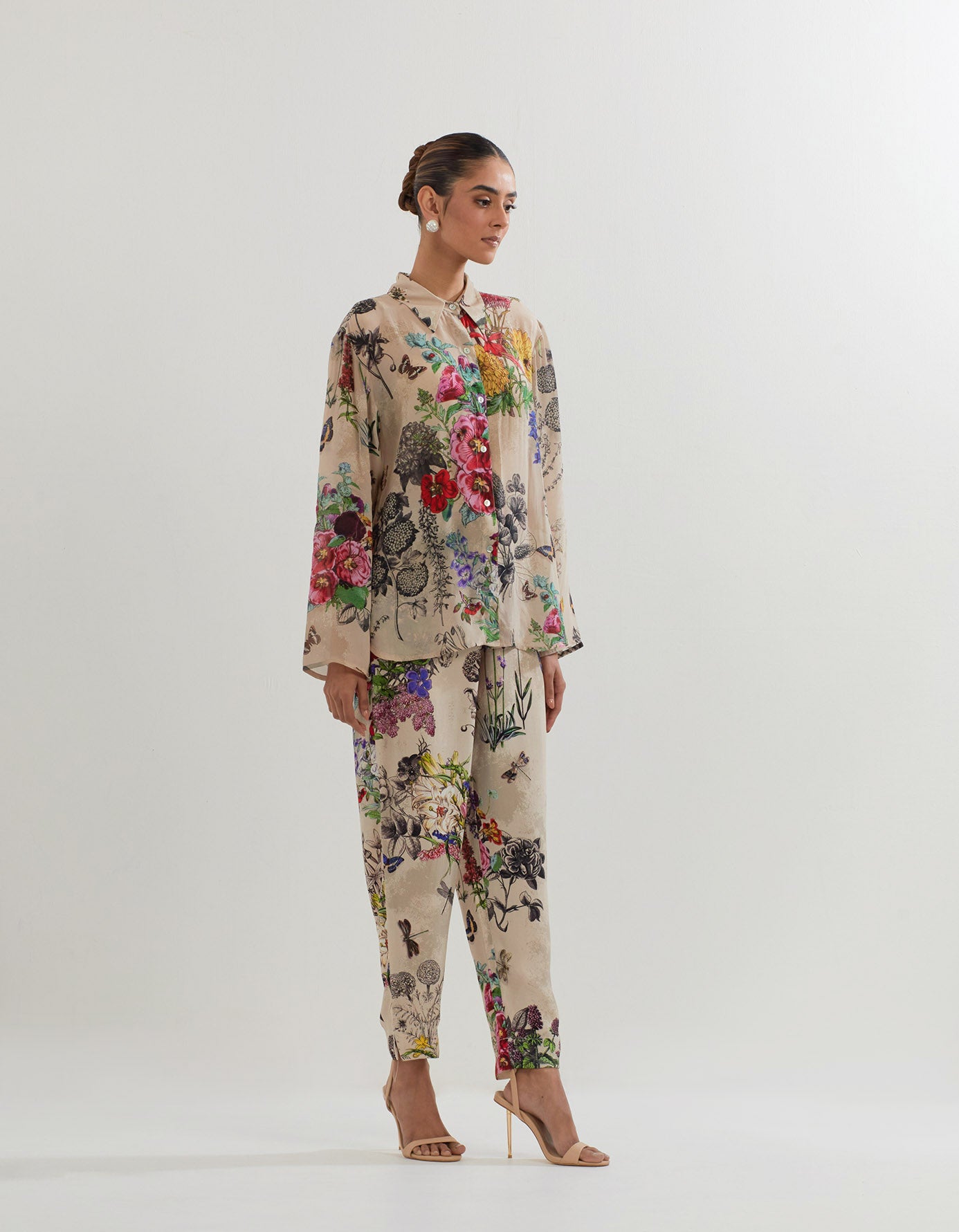 Crepe shirt in botanical print paired with  heavy georgette pants