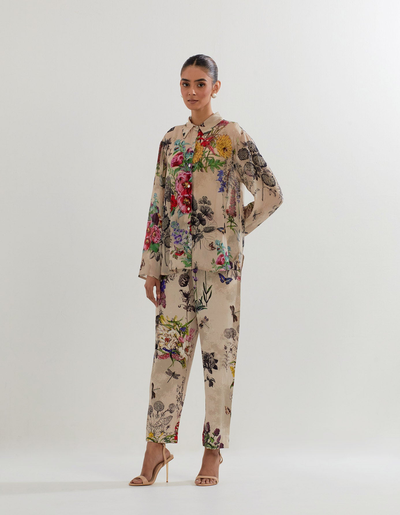 Crepe shirt in botanical print paired with  heavy georgette pants