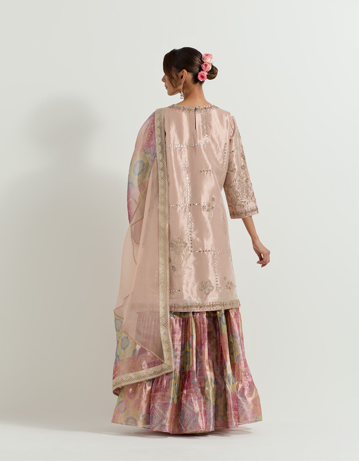 Tissue hand embellished long tunic paired with tissue bandhini printed  pleated sharara and organza and tissue patch work dupatta