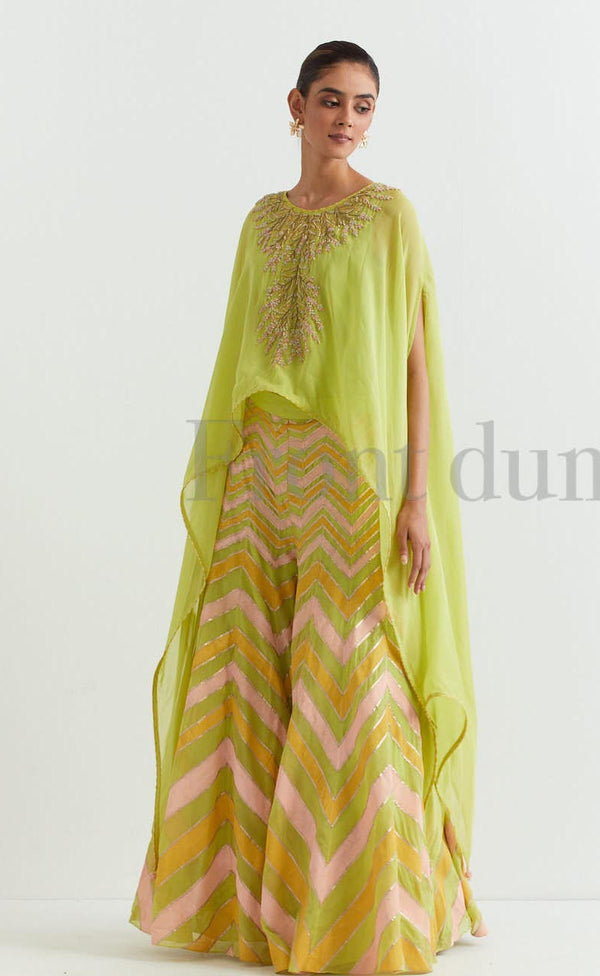 Lime dupatta cape in hand embroidery paired with chevron printed and embroidred sharara pants