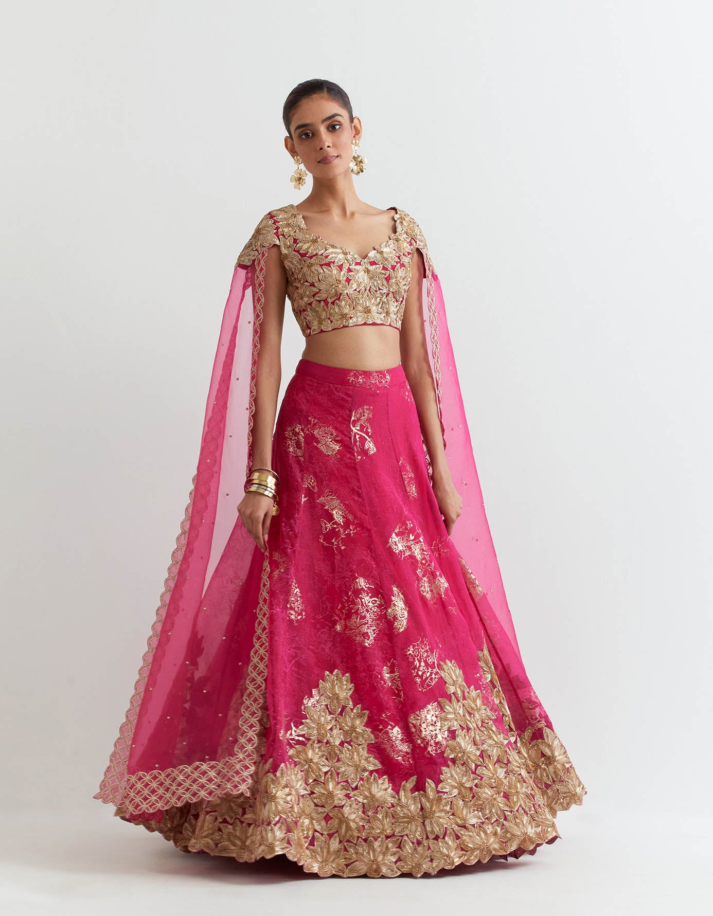 Rosa gota embroidered blouse with attached cape dupatta paired with organza silk gota embroidered skirt