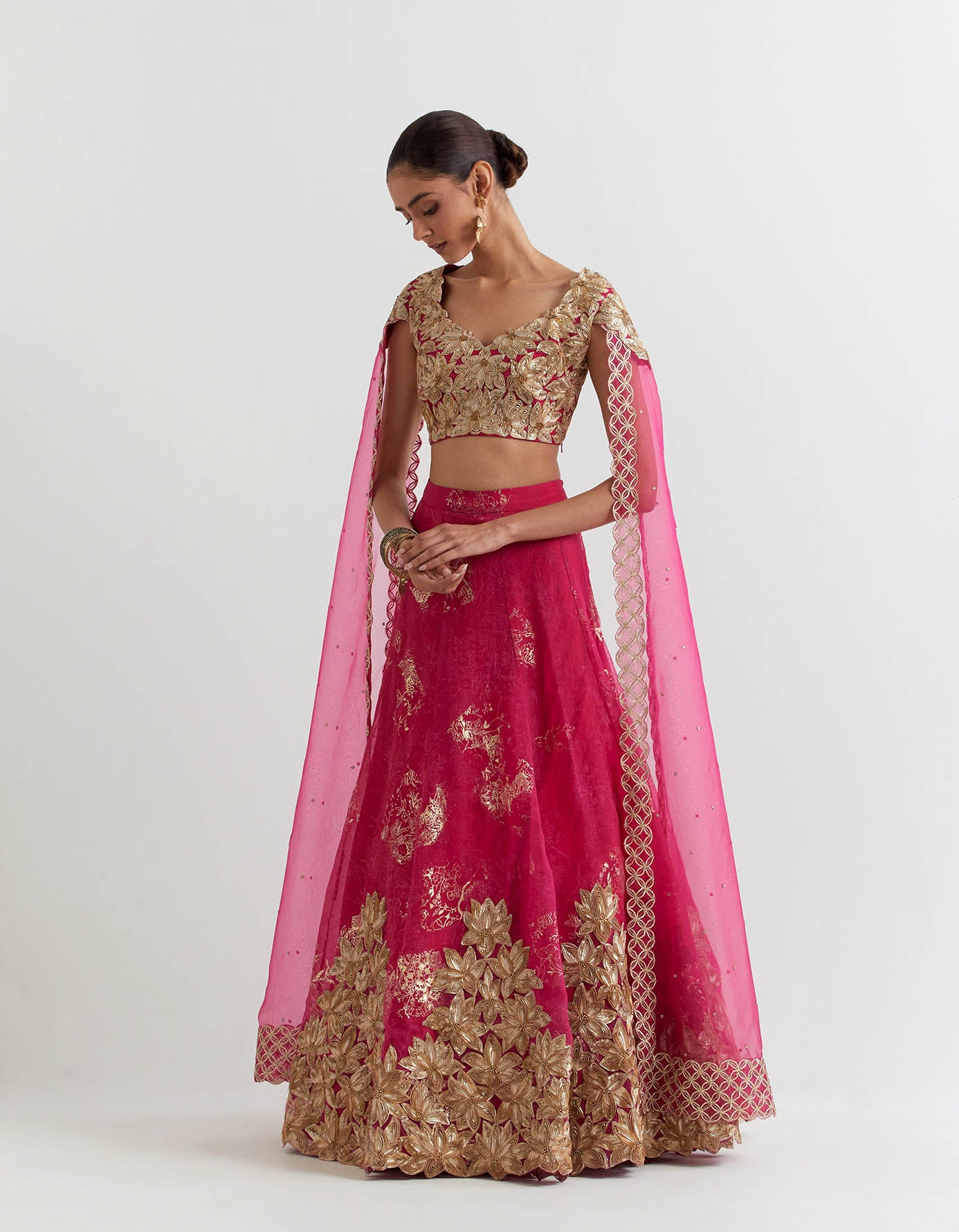 Rosa gota embroidered blouse with attached cape dupatta paired with organza silk gota embroidered skirt