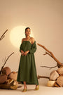 A Chic Two-In-One Ensemble Featuring A Sleek Olive Green Slip Dress