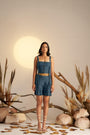 A Trendy Midnight Blue Crop Top With Contrasting White Stitch Detailing