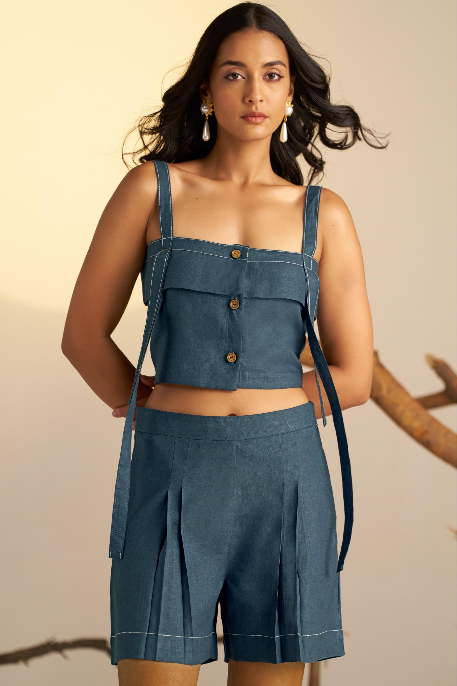 A Trendy Midnight Blue Crop Top With Contrasting White Stitch Detailing