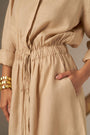 A Sophisticated Shirt Dress In A Soft Cosmic Latte Hue