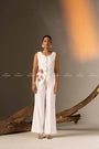 An Elegant White Sleeveless Long Vest Adorned With Delicate Floral Embellishments