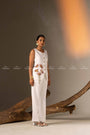 An Elegant White Sleeveless Long Vest Adorned With Delicate Floral Embellishments