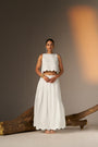 A Flared Skirt With Subtle Blue Finishing For A Crisp, Contemporary Touch